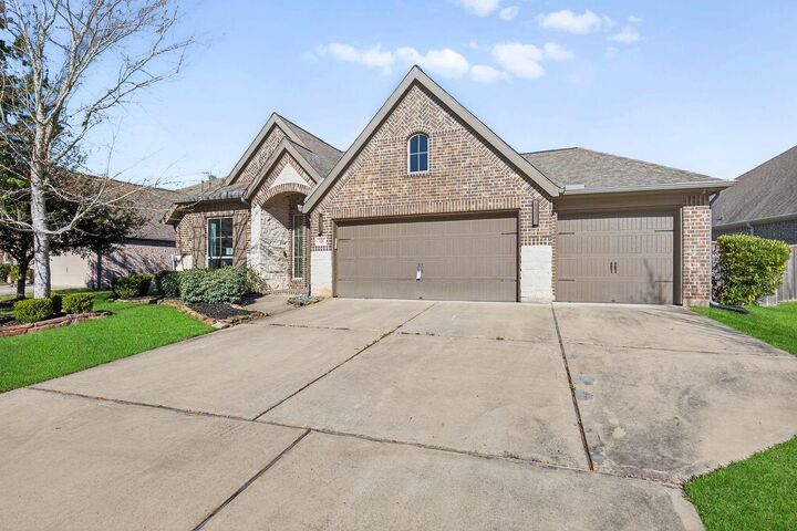 Property Photo:  328 Red Petal Court  TX 77304 