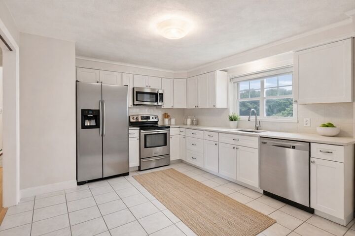 Property Photo: 138 Emerson Gardens Rd 138 MA 02420