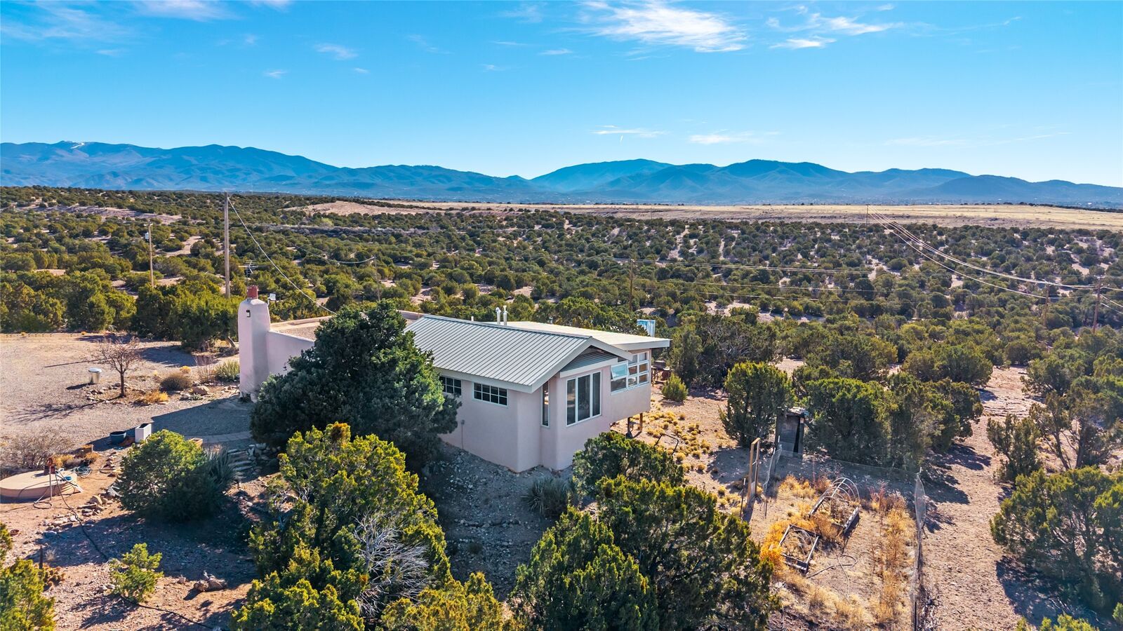 Property Photo:  24 & 26 Calle Pia Tixier  NM 87507 