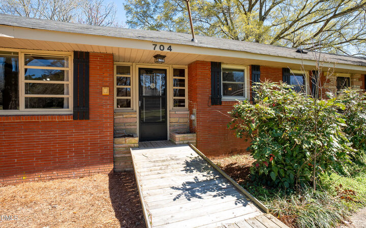 Property Photo:  704 Pearces Road  NC 27597 
