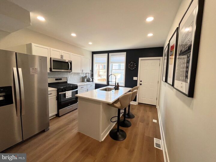 Property Photo:  129 N Rose Street  MD 21224 