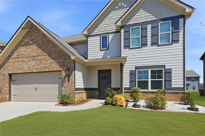 Property Photo:  305 Eleanora Crossing  GA 30052 