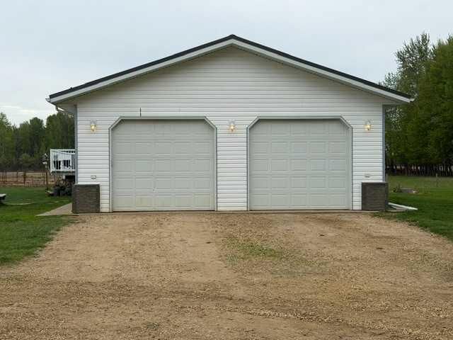 Property Photo: 74120 100 Range Road AB T0G 2K0