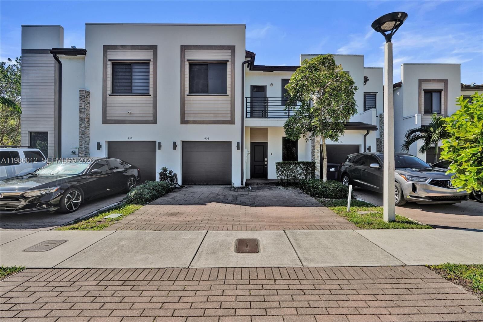 Property Photo:  408 NE 212th Ter  FL 33179 