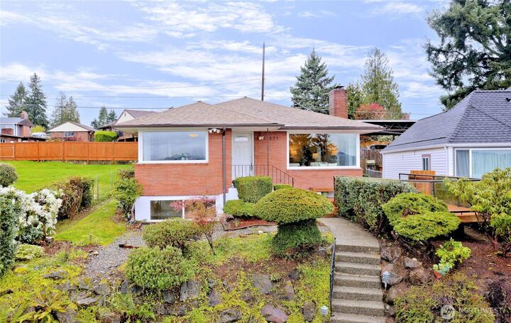 Property Photo:  11027  Auburn Avenue S  WA 98178 