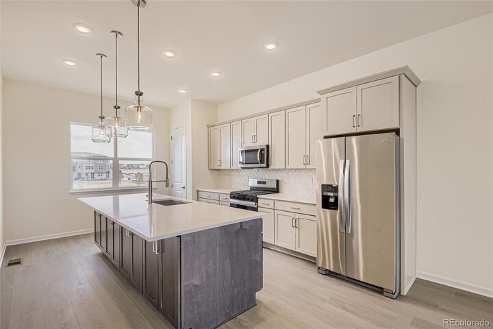 Property Photo:  6273 N Jebel Street  CO 80019 