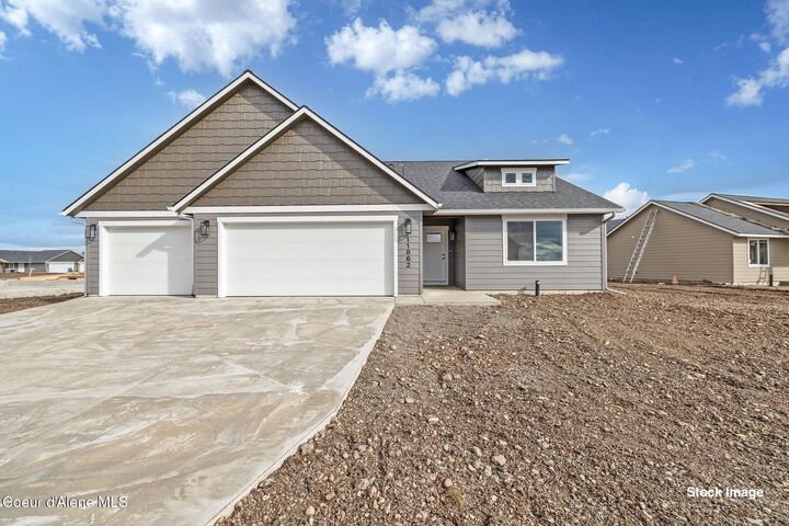 Property Photo:  12013 N Lennon Ln  ID 83858 