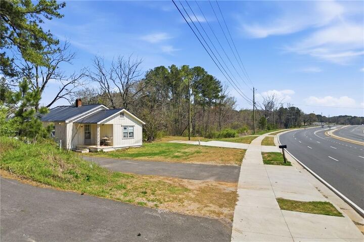 Property Photo:  3823 Cumming Highway  GA 30115 
