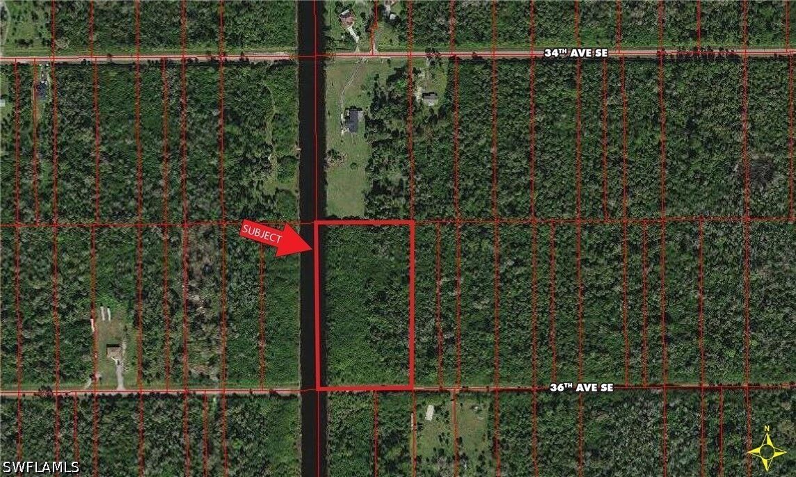 Property Photo:  100 36th Ave SE  FL 34117 
