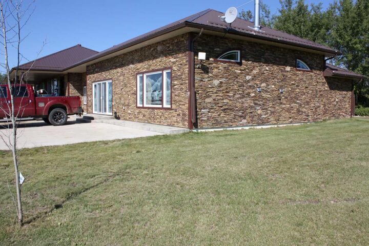 Property Photo: 67305 144A Range Road AB T0A 2C1