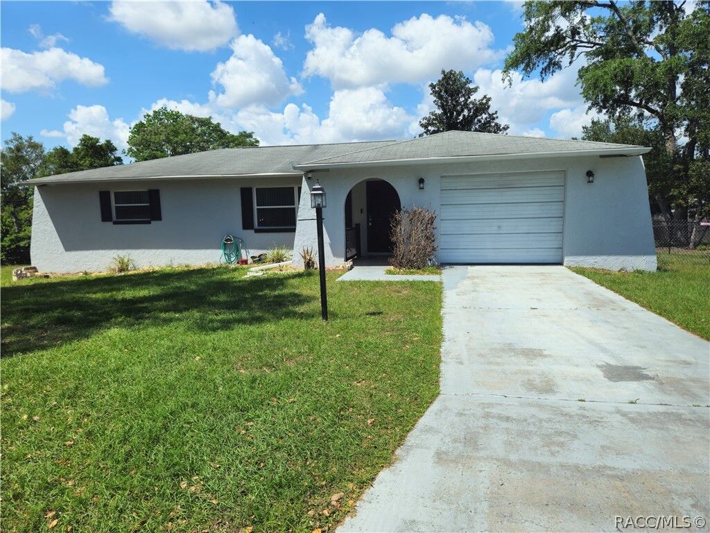 Property Photo:  404 S Adams Street  FL 34465 