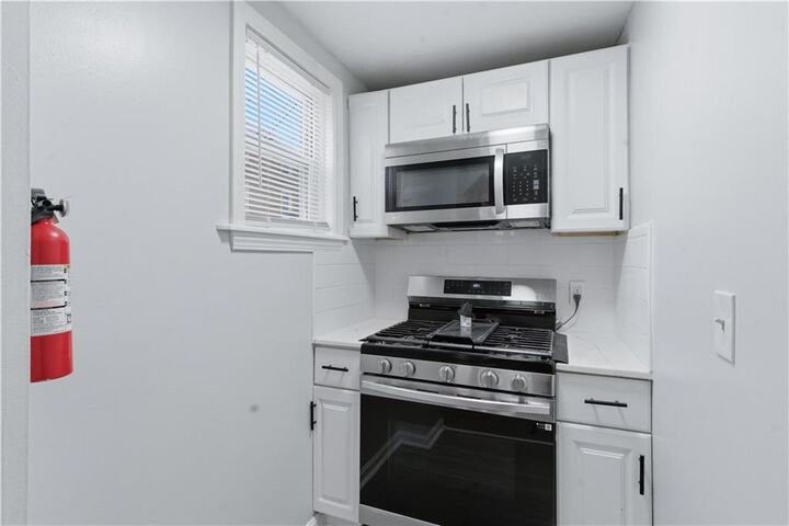 Property Photo:  92 Sylvian Street 1  RI 02863 