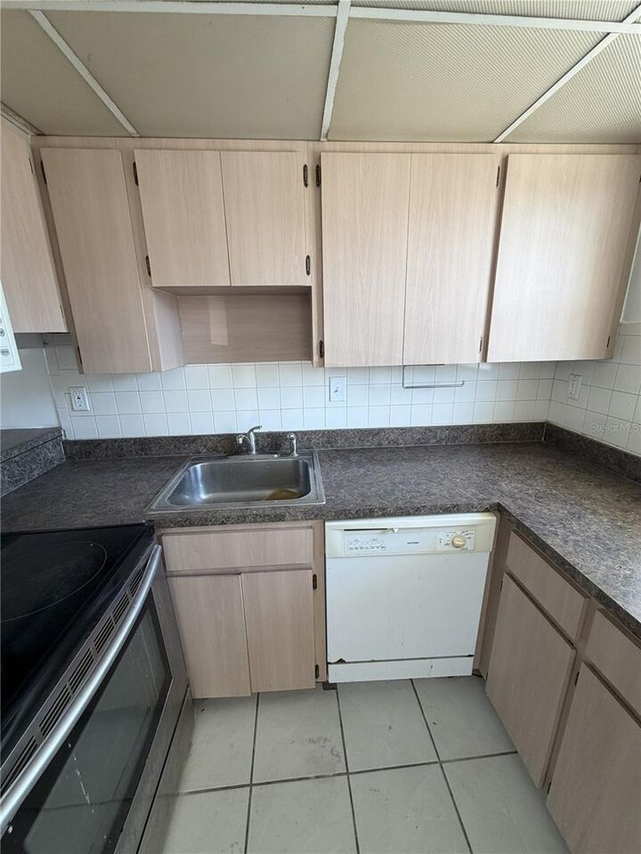 Property Photo:  2625 State Road 590 1623  FL 33759 