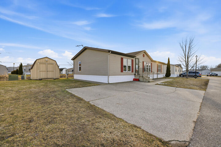 Property Photo:  8592 Gleaner Court  MI 49464 