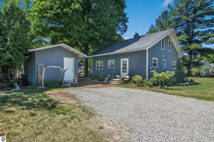 Property Photo:  6033 Aarwood Road  MI 49676 