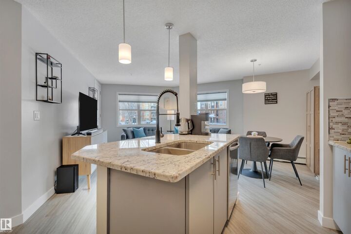 Property Photo:  11453 Ellerslie Road SW 110  AB T6W 1T3 