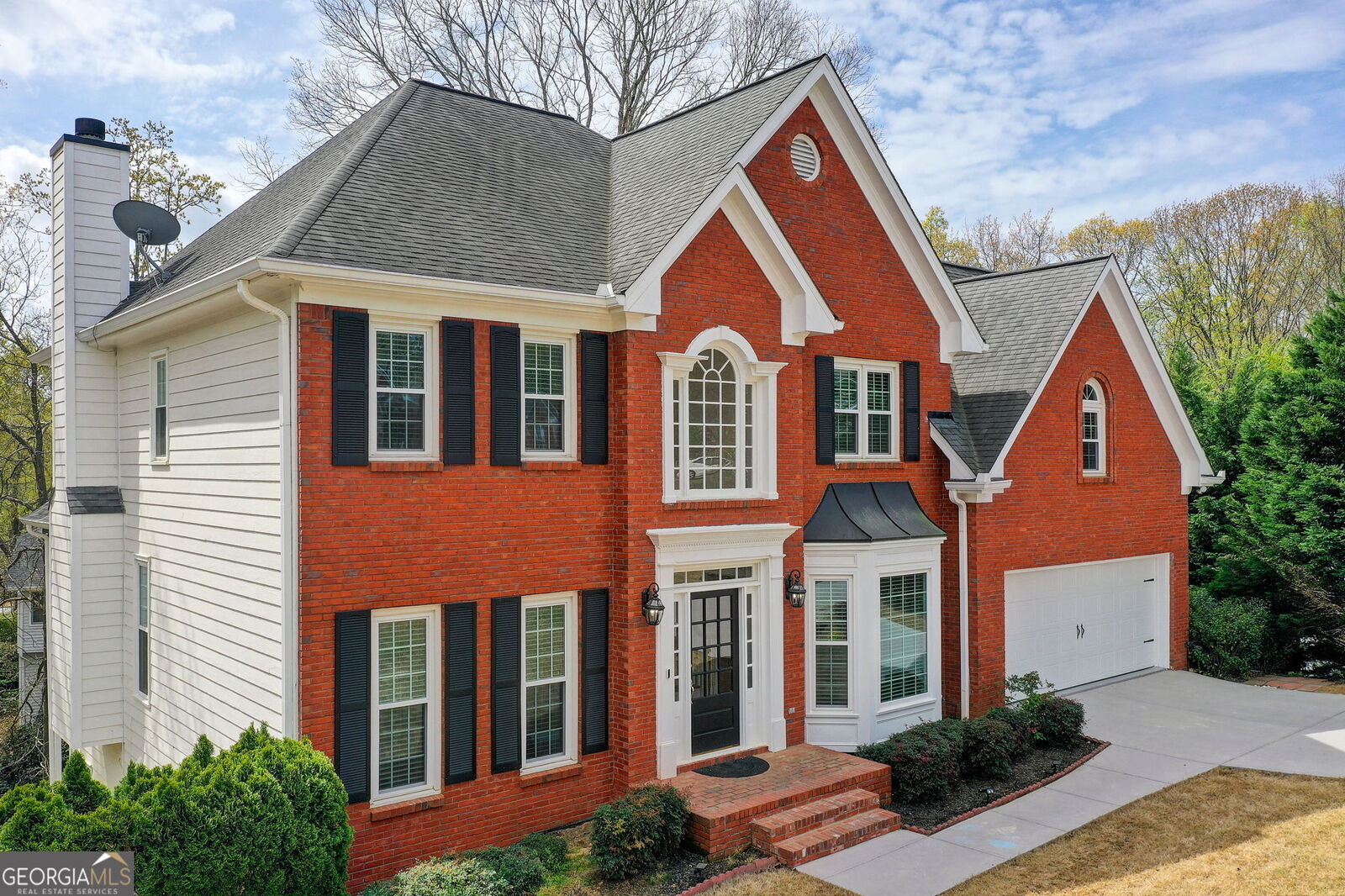 Property Photo:  4910 Red Robin Ridge  GA 30022 