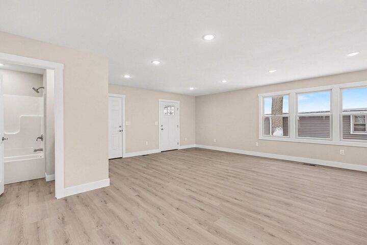 Property Photo:  99 River Street  MI 49404 