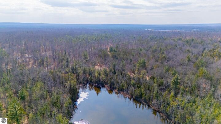 Property Photo:  1.12ac Snowbowl Road  MI 48629 