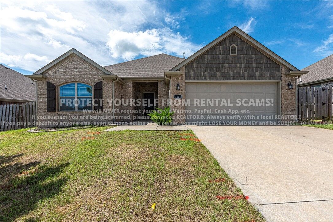 Property Photo:  1111 Tulip Street  AR 72719 