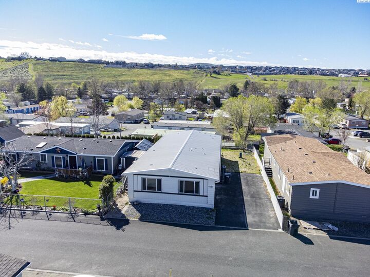 Property Photo:  6509 James St 643  WA 99353 