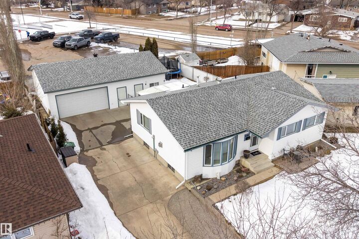 Property Photo:  9028 95 Avenue  AB T8L 1C6 