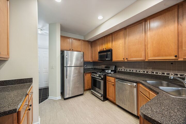 Property Photo:  2556 Camberley Circle 2-813  IL 60154 