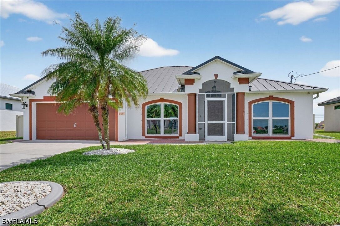 Property Photo: 1223 NW 40th Place FL 33993