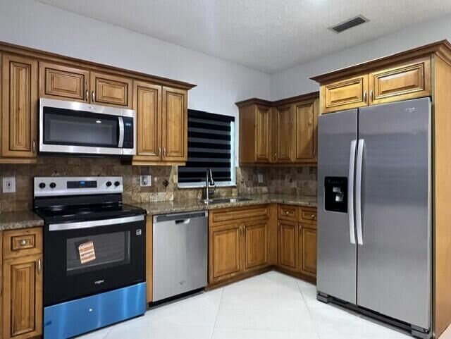 Property Photo:  7600 Edisto Drive  FL 33467 