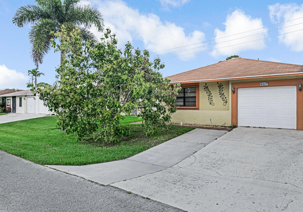 Property Photo:  4917 Luqui Court  FL 33415 