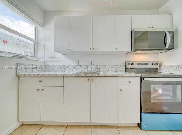 Property Photo:  1887 NW 48th St 1887  FL 33142 