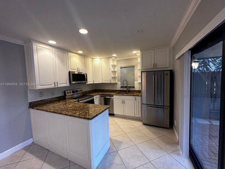 Property Photo: 7671 W Courtyard Run W FL 33433