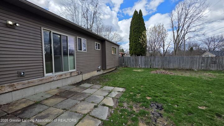 Property Photo:  3636 Coachlight Common Street  MI 48911 