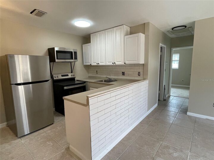 Property Photo:  199 Fulton Street NE 1  FL 33771 