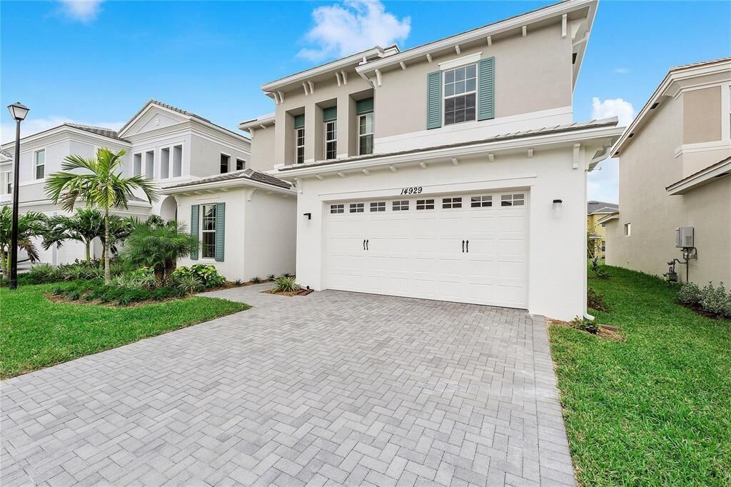 Property Photo:  14929 Redcove Place  FL 33470 