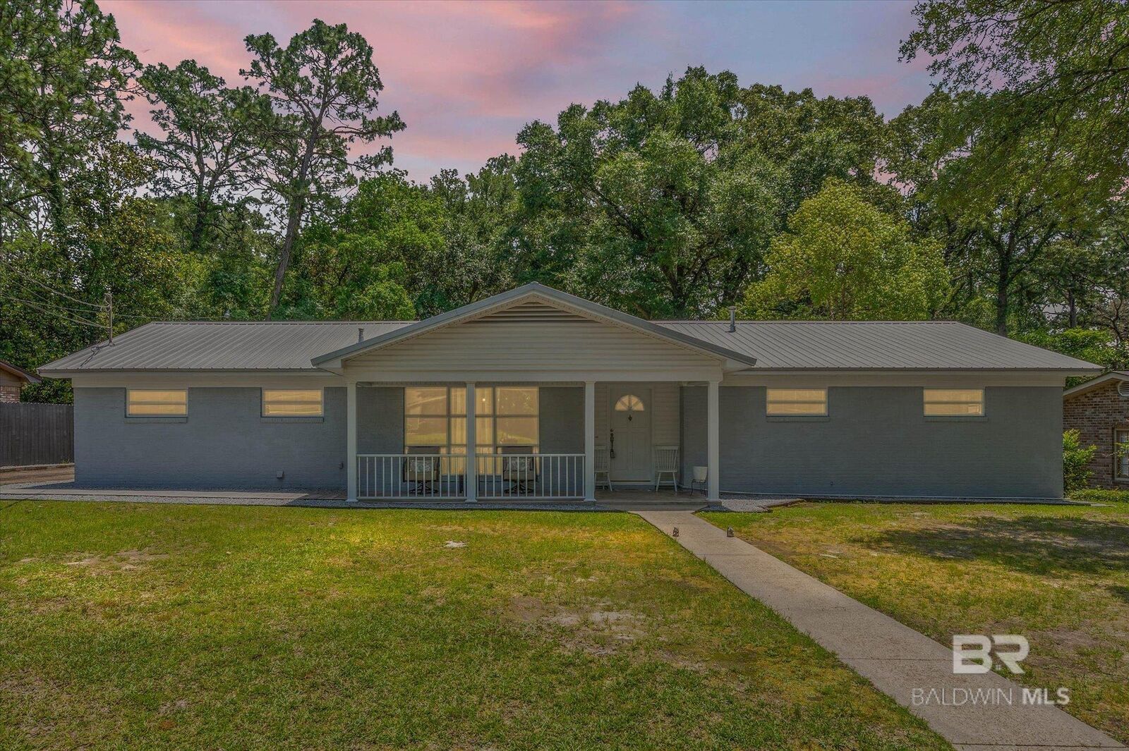Property Photo: 5955 Chalet Drive AL 36608