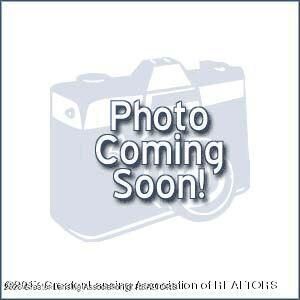 Property Photo:  486 Red Cedar Boulevard  MI 48895 