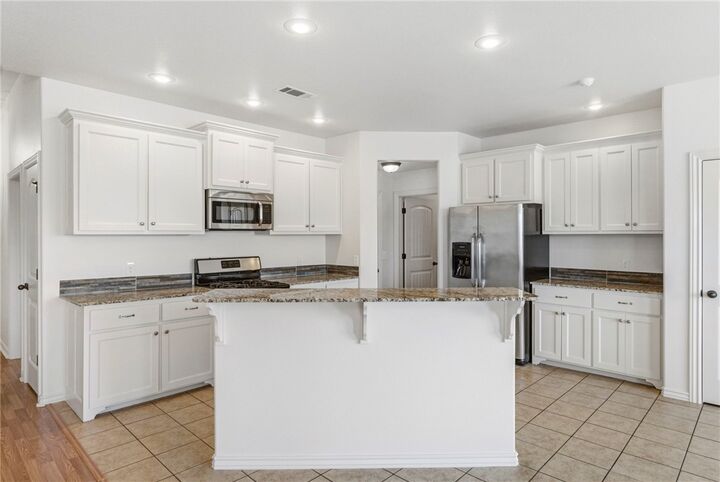 Property Photo:  906 SW Pure Globe Street  AR 72712 