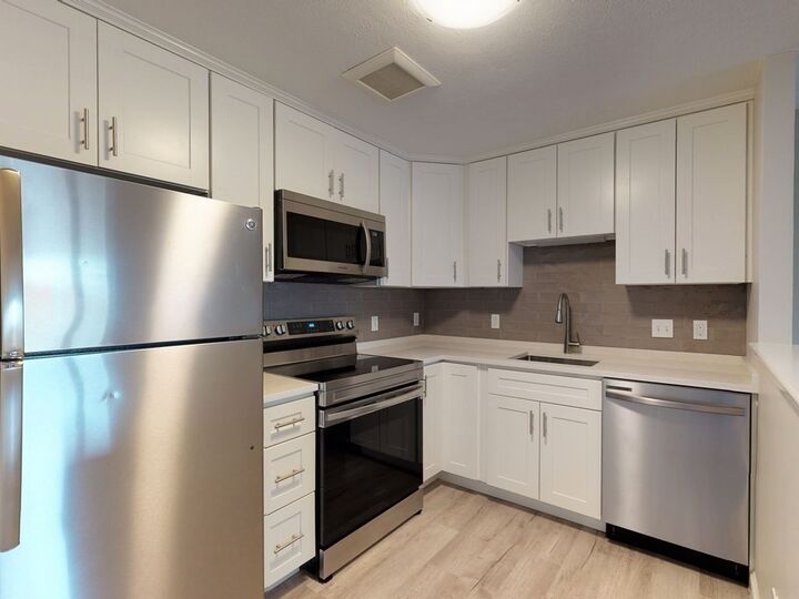 Property Photo:  1105 Lexington St 6-11  MA 02452 