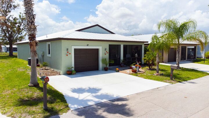 Property Photo:  67 El Camino Real  FL 34952 