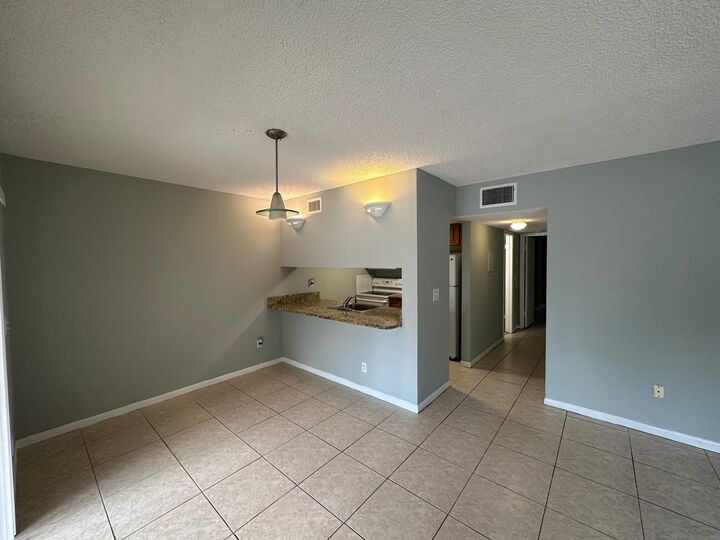 Property Photo:  6031 10th Avenue N 118  FL 33463 