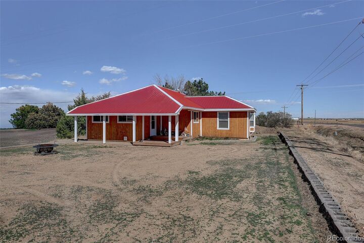Property Photo:  7013 County Road 69  CO 80643 