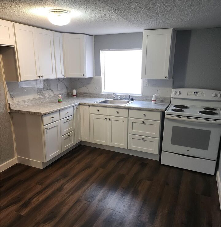 Property Photo:  211 Avenue B 1/2  TX 77568 