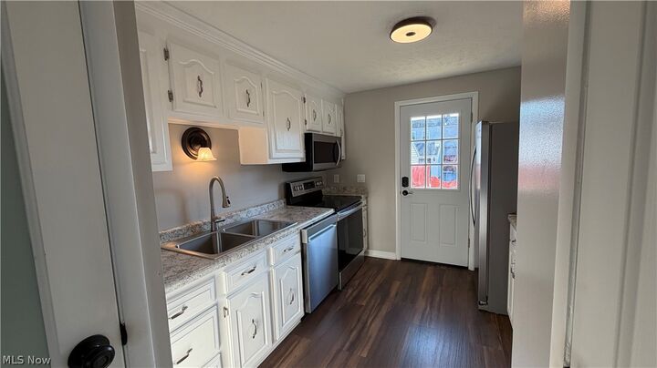 Property Photo: 7489 Essex Drive OH 44060