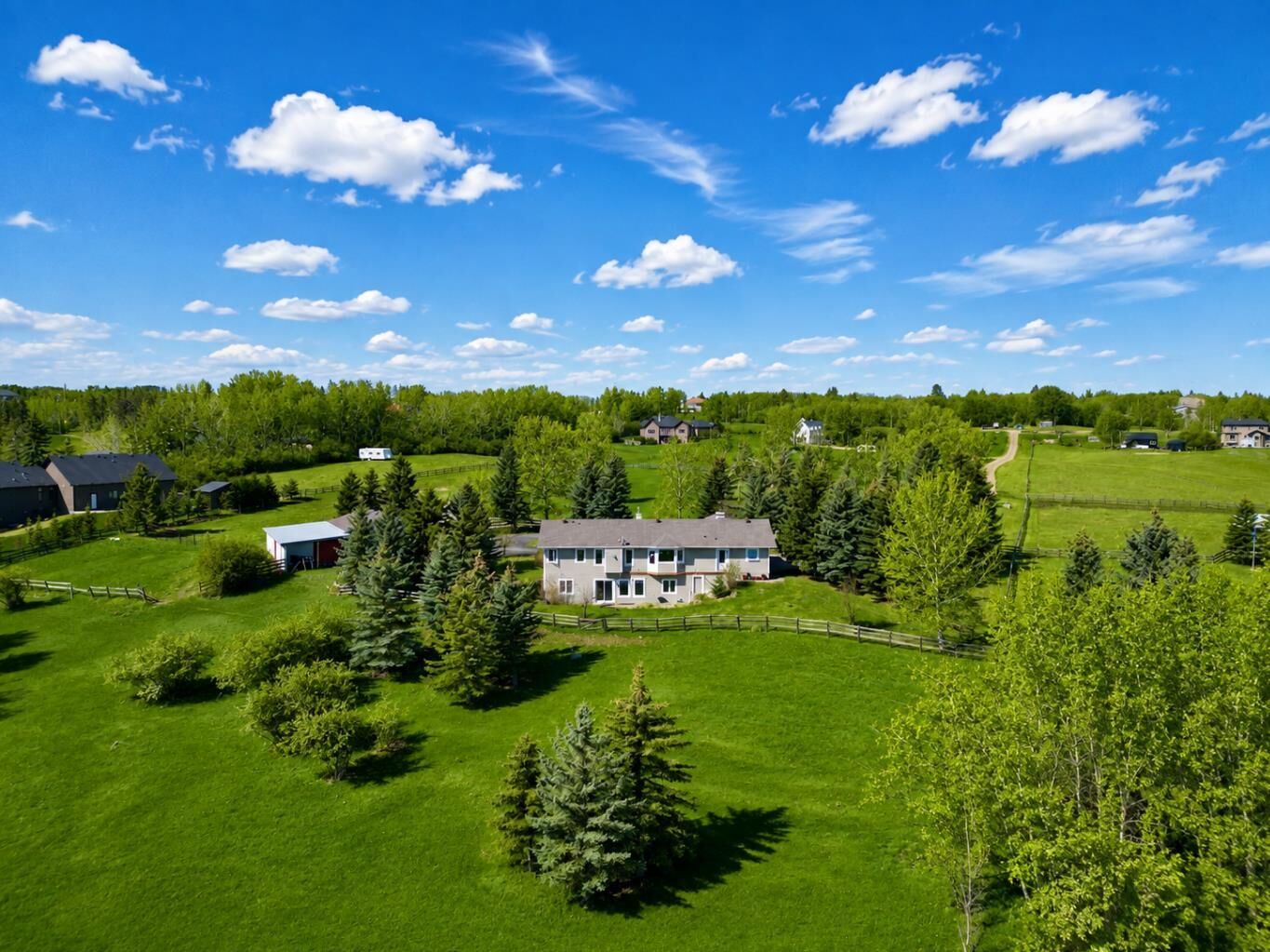 Property Photo: 260048 Bearspaw Road AB T3R 1H4