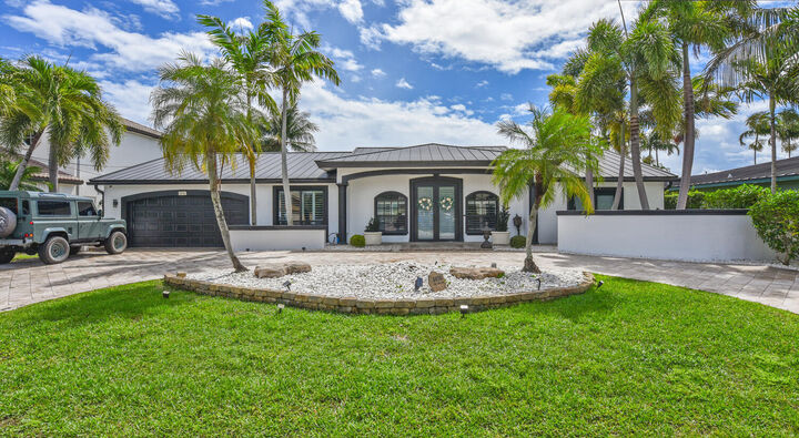 Property Photo:  4030 NE 25th Avenue  FL 33064 