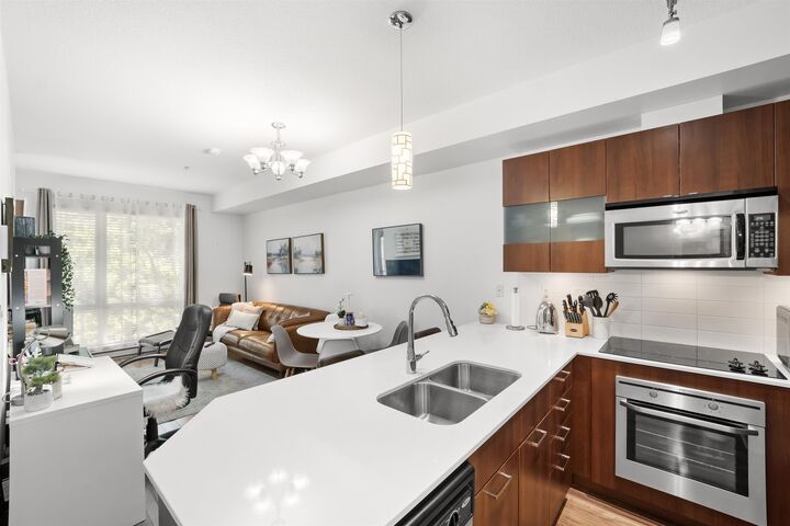 Property Photo: 13321 102A Avenue 203 BC V3T 1P6
