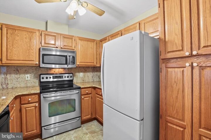 Property Photo:  4404 Silverbrook Lane E102  MD 21117 