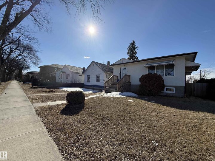 Property Photo:  10835/39/45/49 73 Avenue NW  AB T6E 1C8 