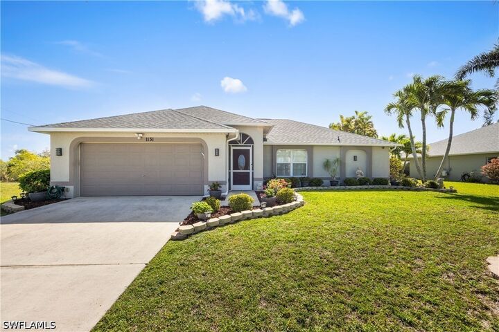 Property Photo:  1131 NW 28th Place  FL 33993 